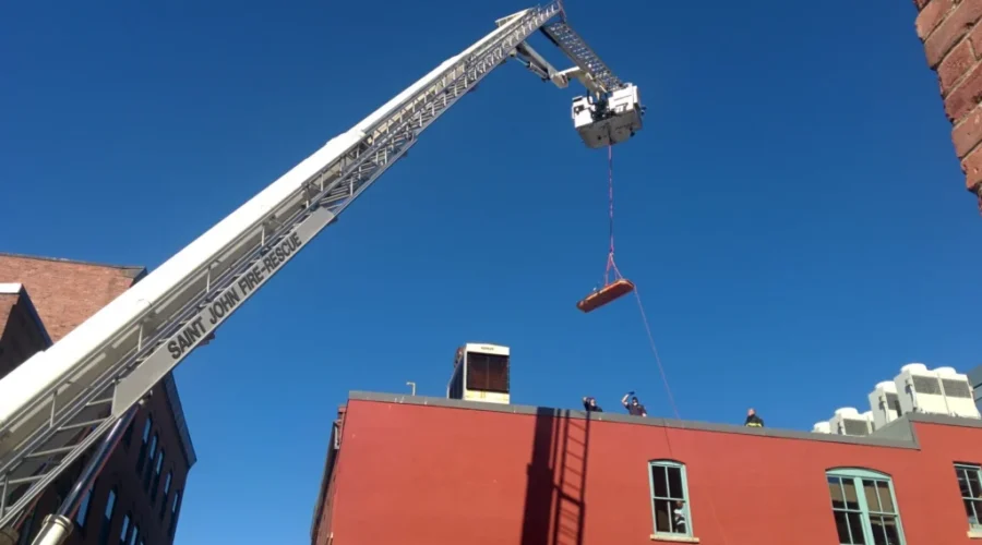 Emergency Crews Rescue Man From CenterBeam Place Roof