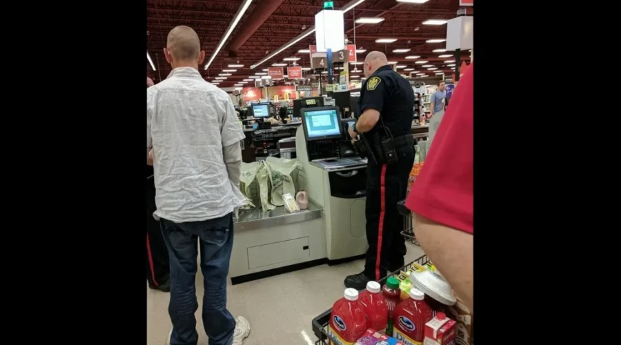Saint John Police Officer’s Act Of Kindness Captured In Photo