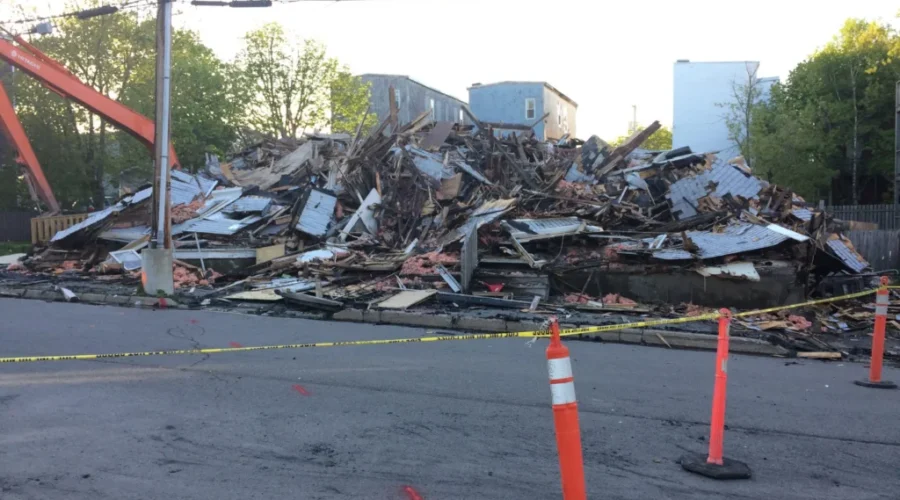 Vacant Building That Burned On Metcalf Street Wednesday Morning Is Torn Down