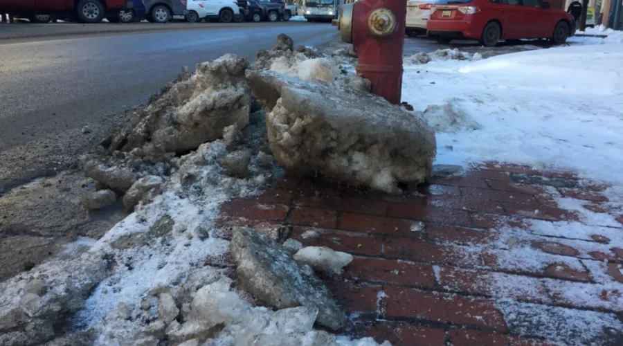 Work Continues To Remove Ice Uptown