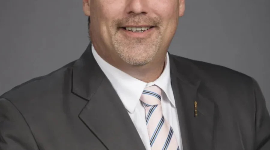 Minister Holland Understands Company’s Financial Predicament