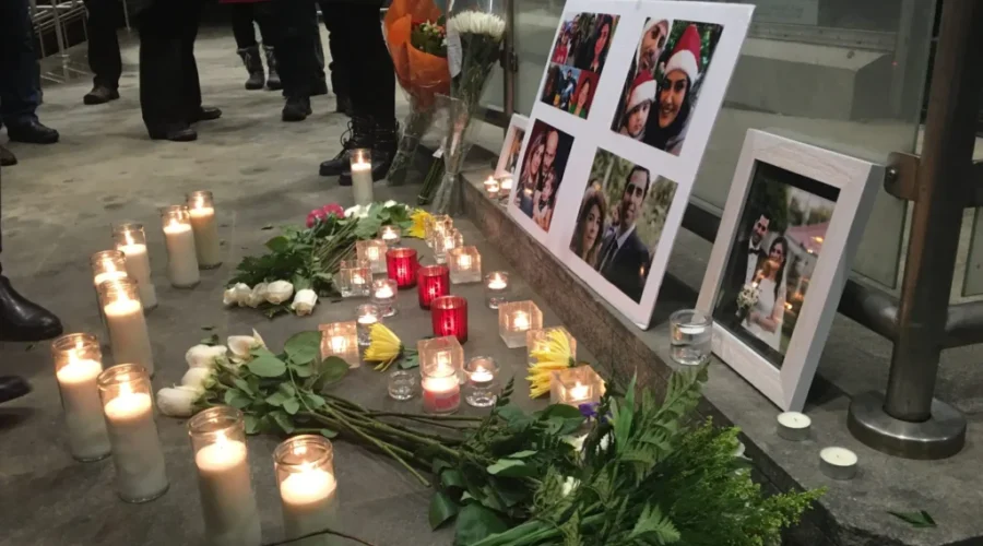 Saint Johners Attend Vigil For Plane Crash Victims
