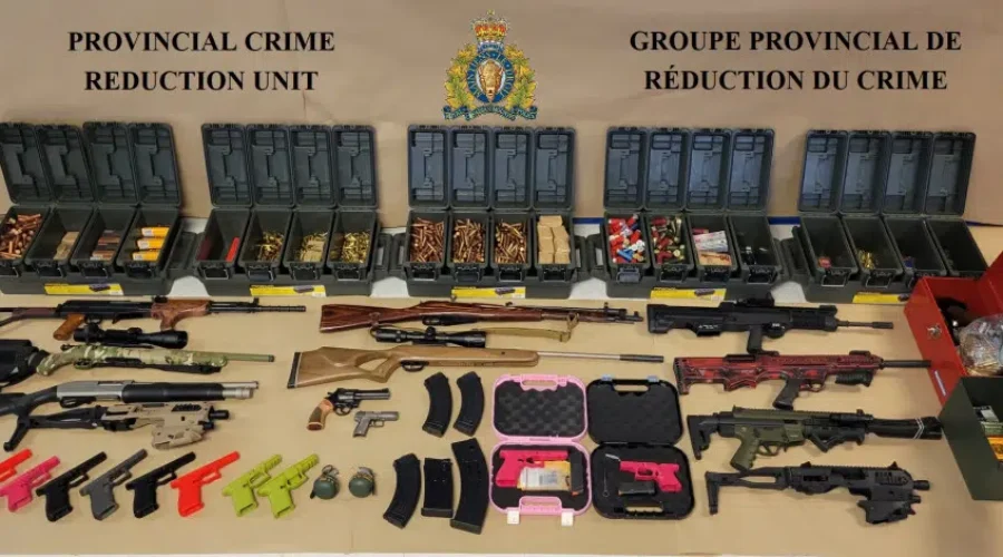 Man, woman arrested after police seize firearms, prohibited weapons
