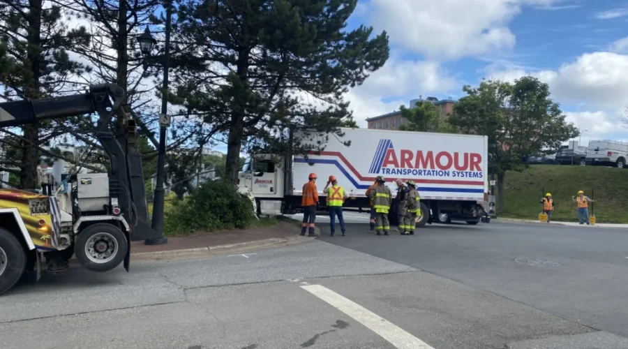 Delivery truck hits utility pole, fence in Saint John