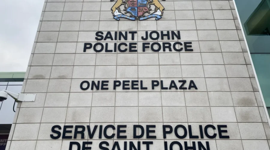 Woman charged with robbing senior in Saint John