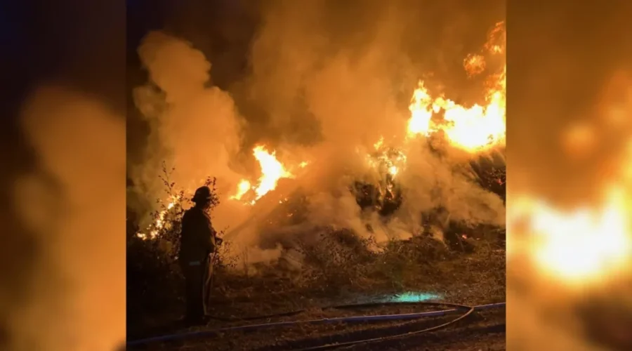 Fire at Prince of Wales gravel pit spreads into woods